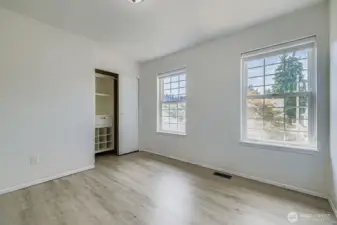 Bedroom 3 includes a built-in closet with custom closet organizer