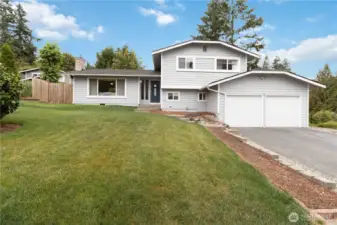 Welcome to this beautifully updated tri-level home nestled in the desirable Fairwood neighborhood. Inside, an inviting vaulted living room with a cozy fireplace flows seamlessly into the dining area—ideal for both everyday living and entertaining. The tiled kitchen with stylish stainless steel appliances overlooks the backyard, while upstairs you’ll find three well-proportioned bedrooms, including a primary suite with a private ¾ bath. The lower level offers a versatile bonus room with sliders leading to a generous fenced yard and patio. Completing this picture-perfect setting is a roomy two-car garage and mature landscaping—all ready for your next chapter. Enjoy being minutes from local shops, dining seatac airport & major freeways.
