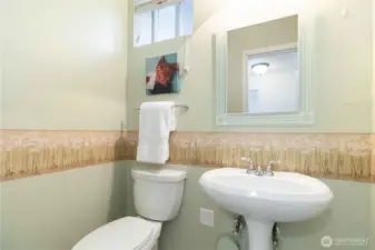lower-level half bath for added convenience.