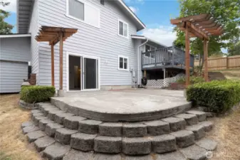 Outdoor patio with tiered steps and easy access to the home.