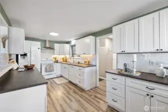 This kitchen is amazing! Ample storage and counter space makes cooking a breeze!