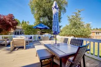 There's also plenty of space for a grill (not pictured) and a large dining table so summer dinners can be enjoyed al fresco. There are also outdoor speakers to enjoy music on the deck.
