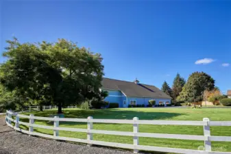 Here's "The Barn" the Farm's multi-use facility with a banquet room, meeting room, fitness room, racquetball court, restrooms/showers and outdoor tennis court, pickleball/basketball court and a large lawn to host outdoor events.