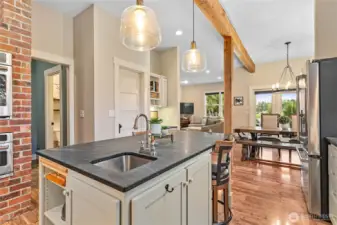 Beautiful country kitchen with an island wet bar and casual seating area.