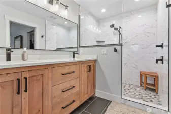 Custom-designed primary bathroom with low-step shower.