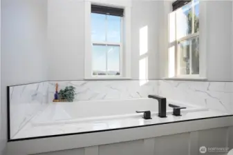 Indulge in more mountain views as you soak in the bubble bath.