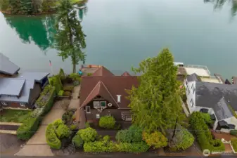 There is a driveway next to the house with tons of extra parking space across the street.