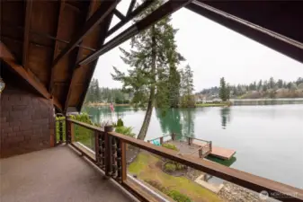 private covered porch off the Primary is the perfect spot to take in natures beauty