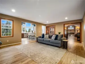 Additional living space off the kitchen that can be closed off from the formal dining and living areas