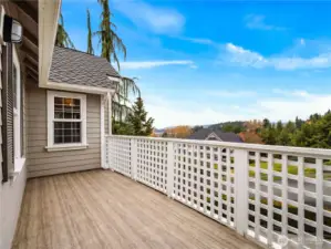 Enjoy the expanded deck off the primary bedroom—perfect for morning coffee, and relaxing evenings