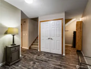 Lower level featuring flexible office space with additional storage to the right of closet doors where central air and hot water systems are neatly housed