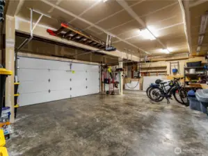 Spacious three-car garage with EV hookup capability and plenty of room for storage, hobbies, and vehicles