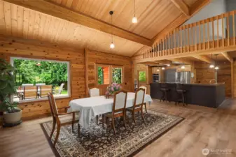 Dining room flowing into kitchen and main living space.
