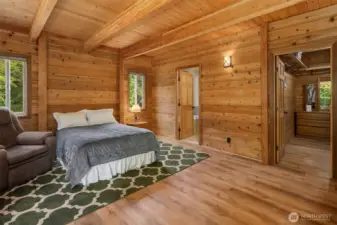 Primary bedroom, main floor with full ensuite bath and walk in closet.