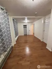 another view of bedroom 3 and 4, note evidence of original wall in the middle