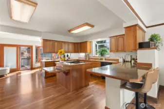 Open kitchen to formal dining & family room