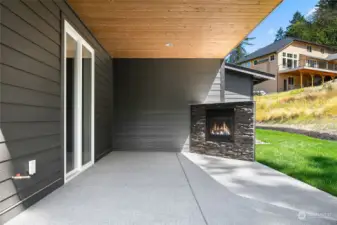 Rear Covered Patio • Rock Faced Gas Fireplace • BBQ Gas Stub