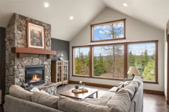 Only surpassed by the stunning views of the Stewart Mountains, the stone fireplace captivates with its rustic charm.