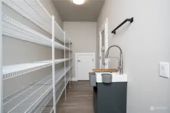 This pantry might just be big enough for all of the things we buy. A small prep sink makes this a great space to get ready for fun