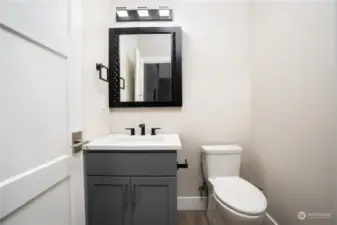 Powder room off the entry way