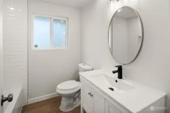 Main Bath completely renovated with brand new vanity, sink faucet & toilet