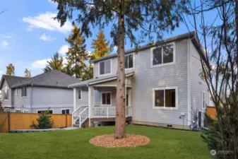 Fully Fenced and Landscaped with gates and paver and stone walkway