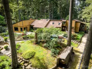 Discover the perfect mix of comfort and space with this enchanting estate, showcasing a grand back yard framed by meticulously landscaped grounds—ideal for unforgettable gatherings!