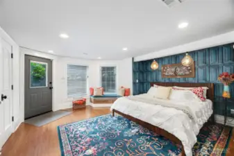 Tranquil Primary Suite fits a King Size Bed with plenty of room. It's a perfect place for rest & repose. Enjoy lounging at the bay window.  There's a private pathway just for you to the swimming pool.