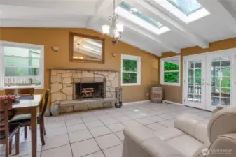 Better view of family room. The two skylights provide so much extra light. The French doors lead to your private double deck and hot tub!