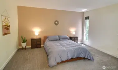 Big windows showcase calming views of the nearby beautiful woodlands.