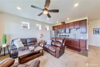 Downstairs living room and kitchen with full size appliances
