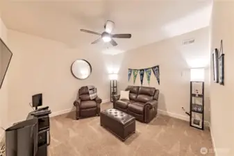 Downstairs flexible space. Wired for a media room. Can be a workout space, den, office... lots of possibilities