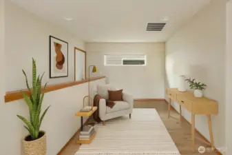 Flexible loft at the top of the stairs provides several options! Photo has been virtually staged.