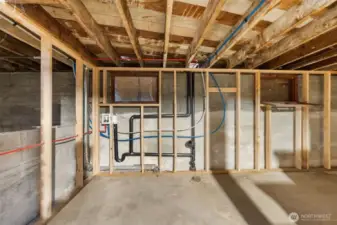 Basement includes roughed-in plumbing for a laundry area.