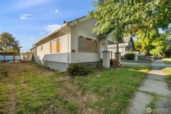 Area alongside the home offers potential for off-street parking.