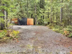 Firepit and woodshed on lot. Septic, water and power. The Glen at Maple falls allows recreational use up to 120 days use per year.