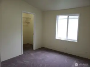 Third Bedroom has a Walk In Closet, Newer Interior Paint and Carpeting.