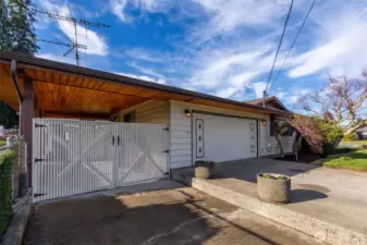 2 car garage, PLUS covered & gated RV/boat parking.