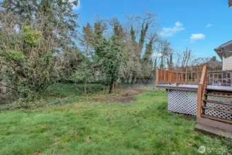 Back yard is private and partially fenced. Room for Big Toy, Dog Run or garden areas.