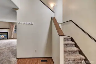 Another view of the Entry foyer area. Stairs leading to the upper level with a mid-way landing. Easy to navigate moving furniture to the upstairs rooms.