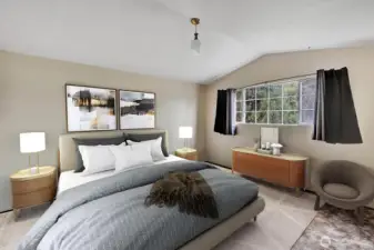 Primary suite on upper level of the home. Room will accommodate a king size bed and additional furniture for your comfort. Virtually staged.