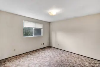 3rd bedroom on the upper-level faces East. Again, room will accommodate double bed and or make this an office or work out room. You decide.