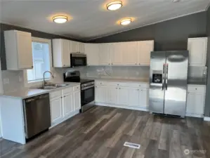 Huge kitchen with stainless appliances too.