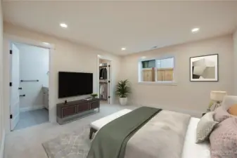 Primary bedroom with en-suite bath and walk-in closet **Virtually staged