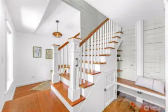 Built in bench, reclaimed newel posts from Seattle, so many thoughtful details honoring the history of the home and the craftsmanship of the era.