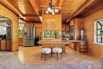 Kitchen with breakfast bar seating.