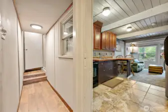 Off the Kitchen - Hallway Leads to the Primary Retreat.