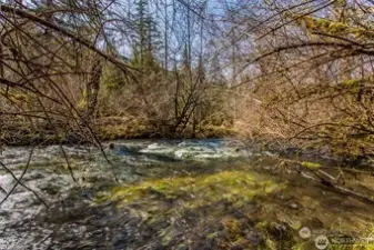 You'll hear the sounds of Big Creek from the Party deck. A 3 min walk from property.