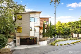 West Bellevue location! Swanky oversized 4-car garage with glass light garage door