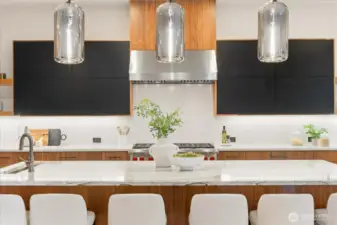 Floating Belmont upper cabinets with upward hinged openings.